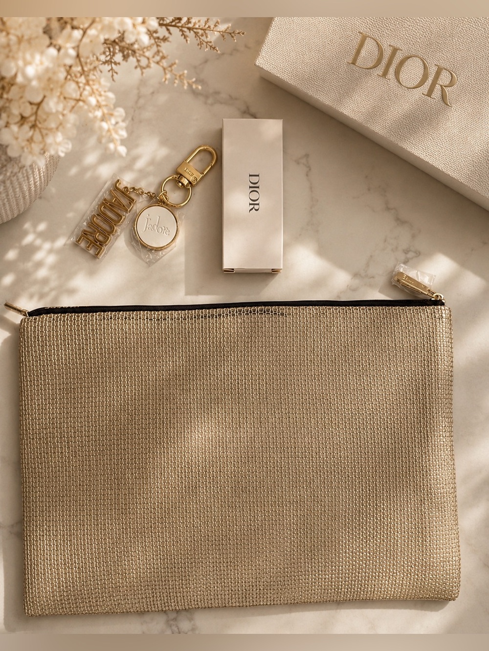 Dior Gold Metallic cosmetic pouch with matching keychain